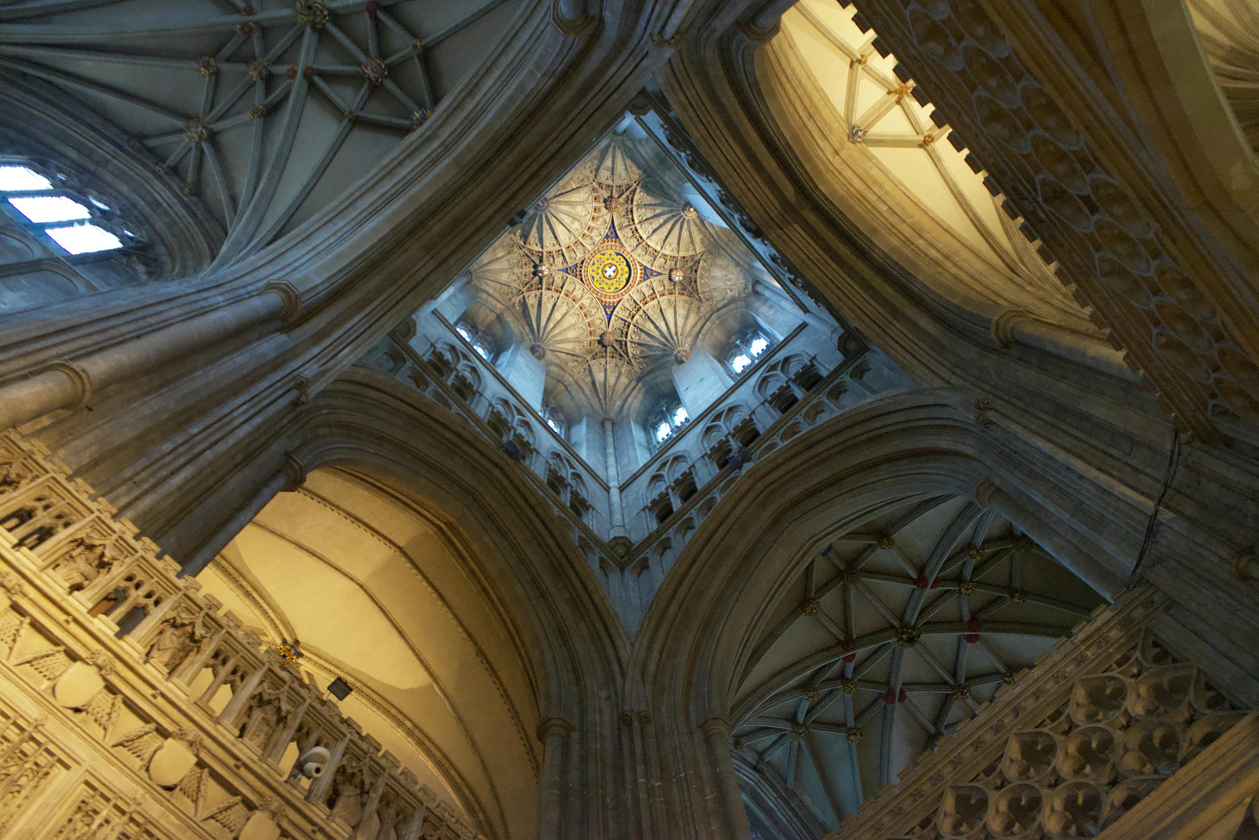 Explore the intricate gothic architecture of Canterbury Cathedral's stunning ceiling.